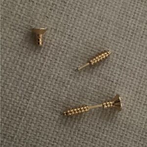 NEW golden screw earrings. 1 set